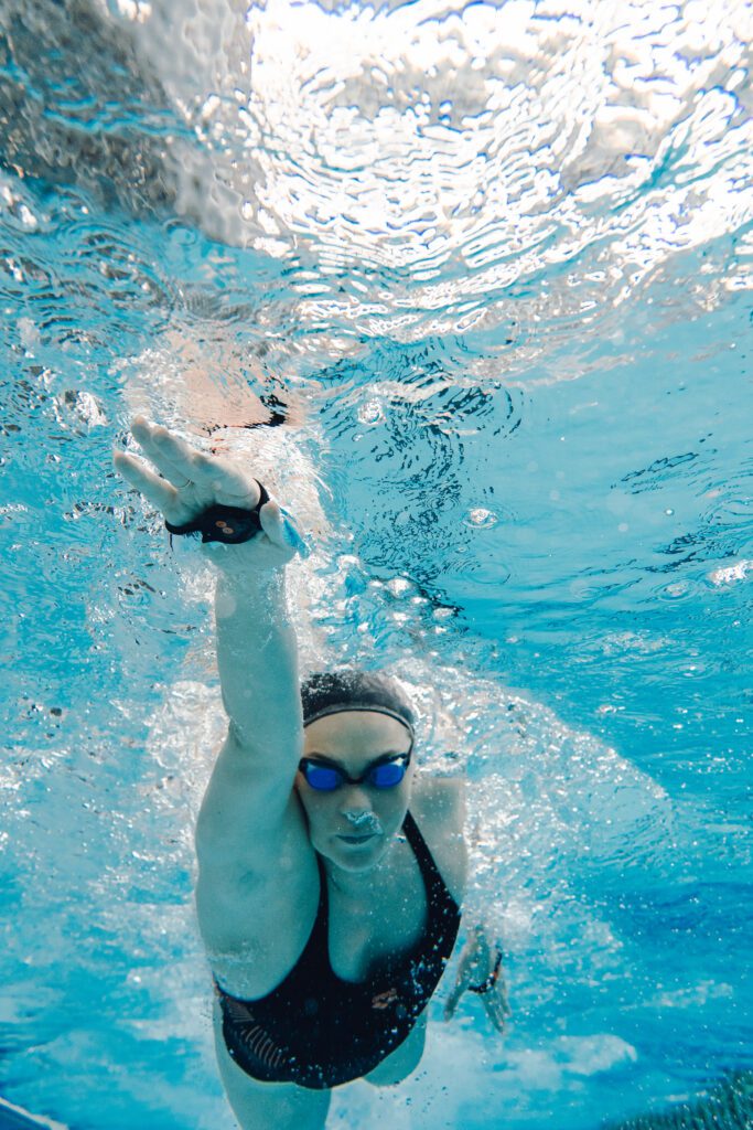 woman swimmer powers through pool with coaching from Mindful Swimming in Greenville SC using eo SwimBETTER technology